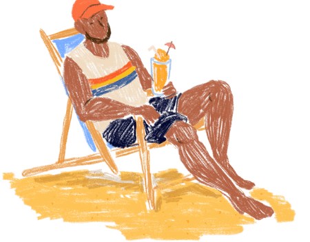 海辺で寝そべる男性